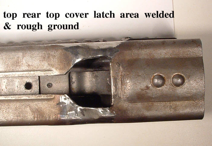Feed cover latch area welded &amp; ground.