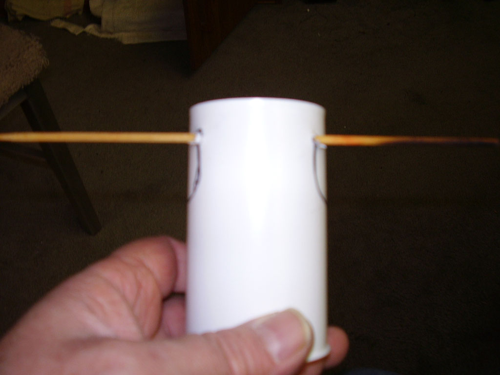 run the scroll saw blade through the same side of both U holes.  Cut and bend.