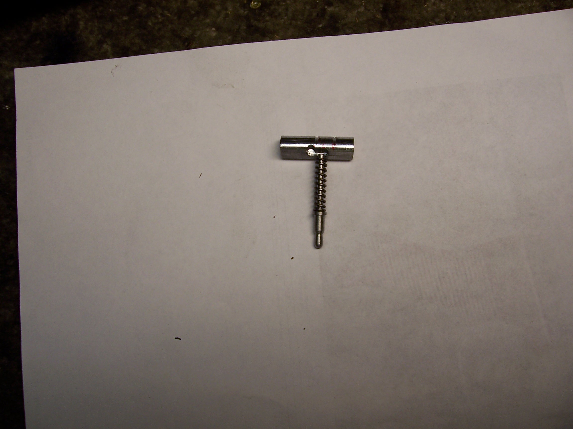 FAL trigger spring plunger in the slot in the safety plunger in the safe mode.